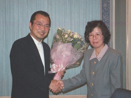 Mr. Shozo Okuda who is a professional trumpeter become a music adviser of GJO, he was presented flowers from Mrs. Shibata who is band master's wife.